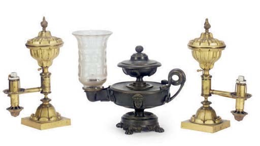 A PATINATED BRONZE FLUID LAMP AND A PAIR OF GILT-METAL FLUID LAMPS,