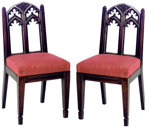 A SET OF FOUR CONTINENTAL CARVED MAHOGANY GOTHIC REVIVAL SIDE CHAIRS,