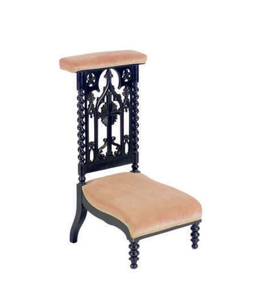 A CONTINENTAL GOTHIC REVIVAL EBONISED PRIE DIEU,