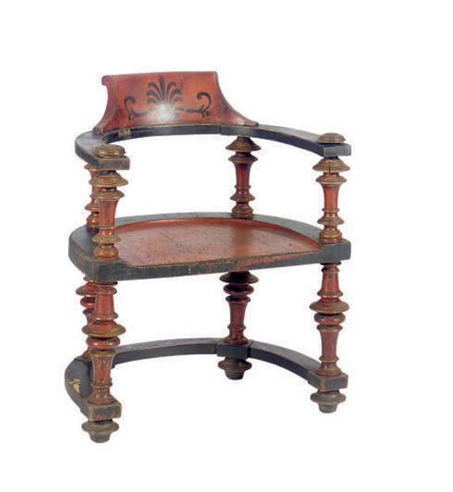 A PAIR OF RED AND BLACK PAINTED CARVED WOOD ARMCHAIRS,