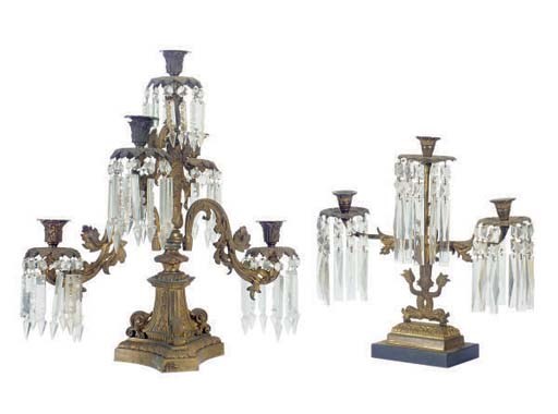 A THREE PIECE GILT-METAL AND CUT GLASS GARNITURE,