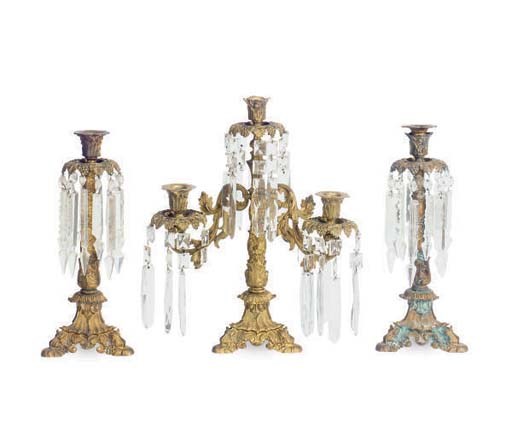 A CONTINENTAL GILT-METAL AND CUT GLASS THREE PIECE GARNITURE,