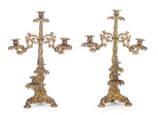 A PAIR OF AMERICAN GILT-BRONZE FIVE-LIGHT CANDELABRA,