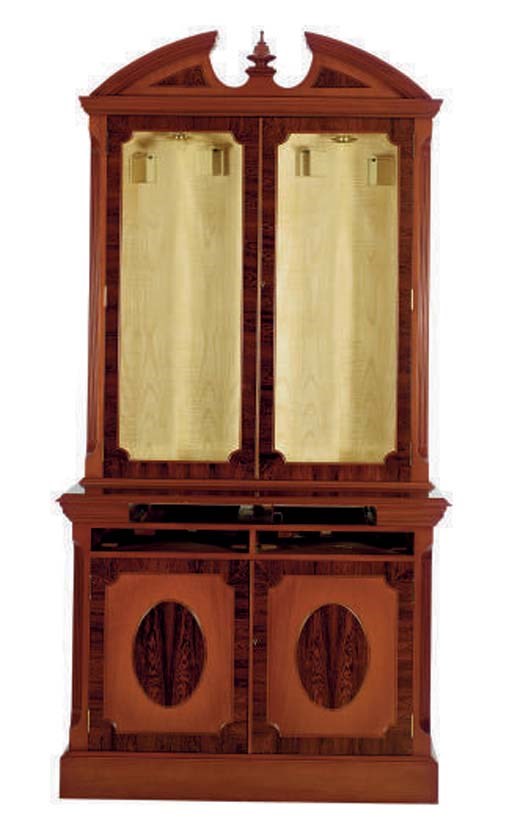 A TWO-PART MAHOGANY GUN CABINET,