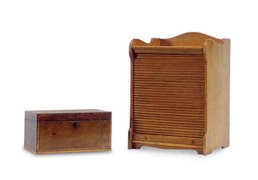 AN ENGLISH MAHOGANY TEA CADDY TOGETHER WITH AN AMERICAN OAK STATIONARY CUPBOARD,