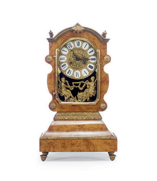 A CONTINENTAL GILT-METAL MOUNTED AMBOYNA MANTLE CLOCK,