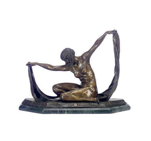 A PATINATED BRONZE FIGURE OF A DANCER,