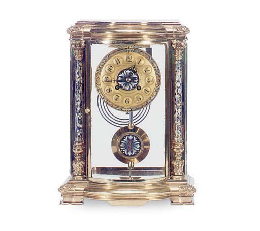 AN POLYCHROME ENAMELLED BRASS MANTLE CLOCK,