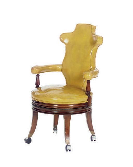 AN ENGLISH LEATHER UPHOLSTERED MAHOGANY SWIVEL DESK CHAIR,