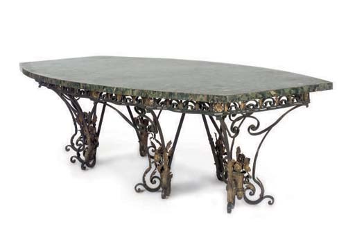 A CONTINENTAL PARCEL-GILT AND PATINATED WROUGHT-IRON AND APPLIED-METAL MARBLE-TOPPED DINING TABLE,