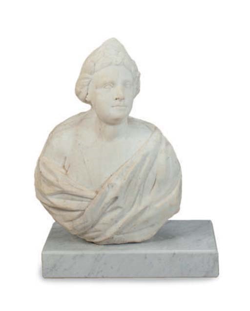 A CARVED STONE BUST OF A MAN,
