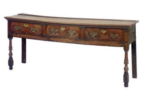 A GEORGE III OAK DRESSER,