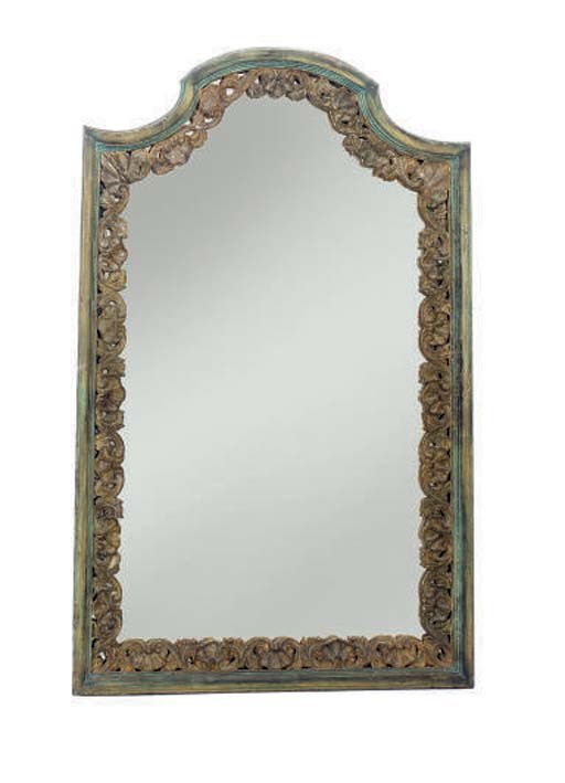 AN ITALIAN CARVED AND PAINTED WALL MIRROR,