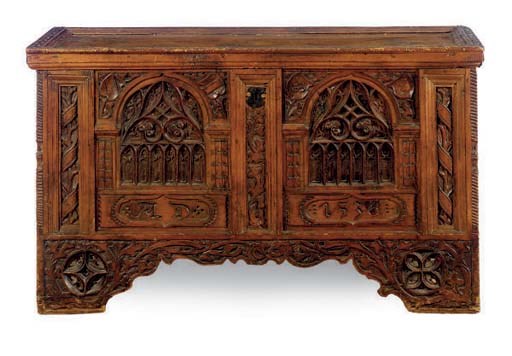 AN ENGLISH GOTHIC REVIVAL CARVED COFFER,