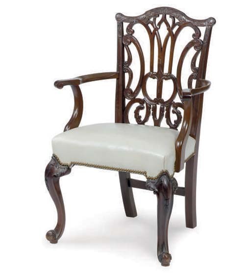 A SET OF TEN CARVED MAHOGANY DINING CHAIRS,