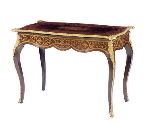 A NAPOLEON III GILT-BRONZE MOUNTED AMARANTH AND TULIPWOOD MARQUETRY WRITING TABLE,