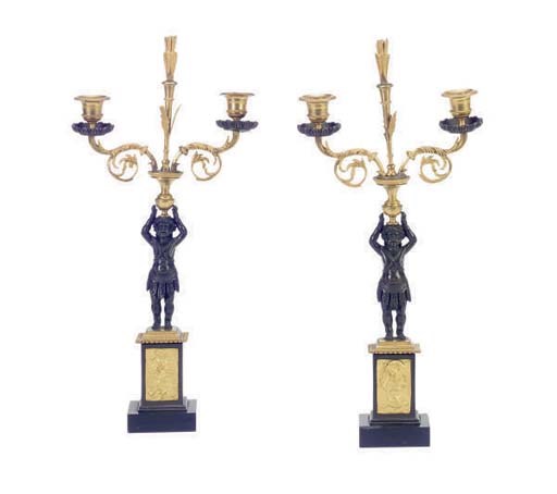 A PAIR OF GILT AND PATINATED BRONZE TWO LIGHT CANDELABRA,