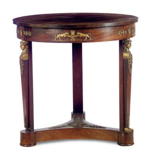 A FRENCH GILT-METAL MOUNTED MAHOGANY CENTER TABLE,
