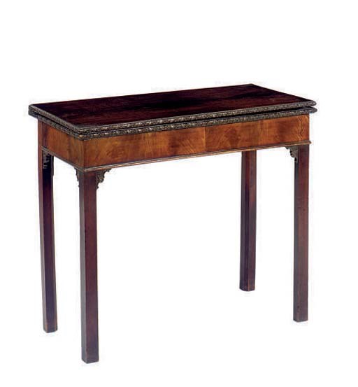 A GEORGE III MAHOGANY FOLD OVER CARD TABLE,