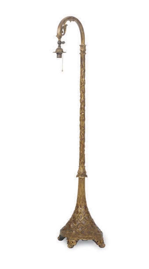 A CARVED GILTWOOD FLOOR LAMP,
