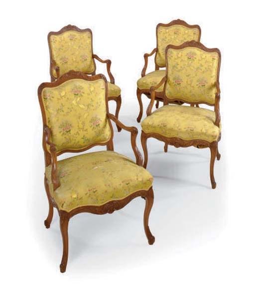 A SET OF FOUR FRENCH PROVINCIAL CHESTNUT FAUTEUILS,