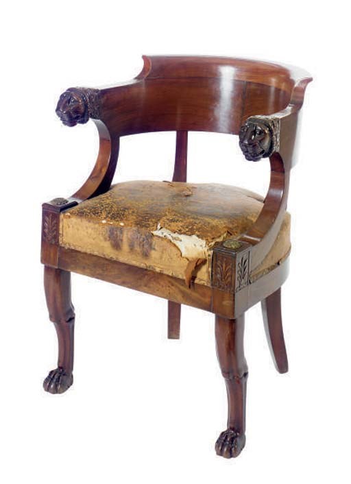 AN EMPIRE MAHOGANY CARVED FAUTEUIL,