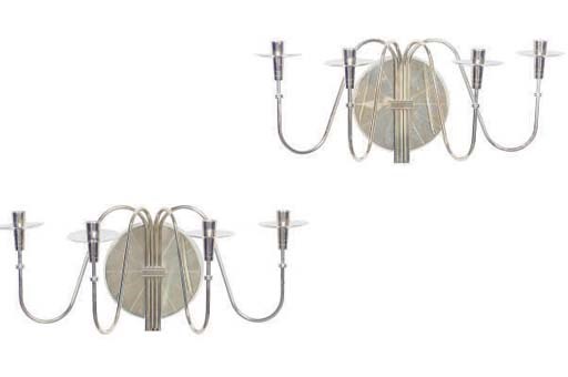 A PAIR OF SILVERED FOUR-LIGHT SCONCES,
