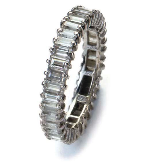 A DIAMOND ETERNITY RING BY GÜBELIN