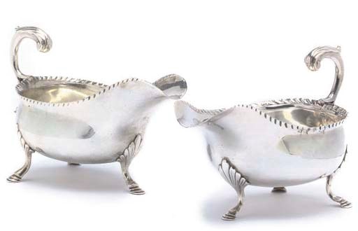 A GEORGE III SILVER SAUCE BOAT
