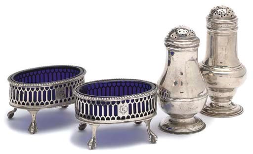 A PAIR OF GEORGE III PIERCED OVAL SILVER SALTS