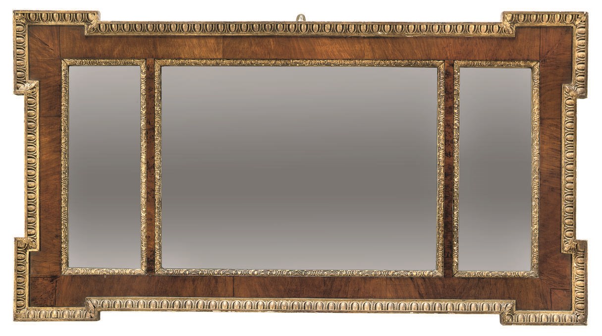 A WALNUT AND PARCEL-GILT TRIPLE-PLATE MIRROR