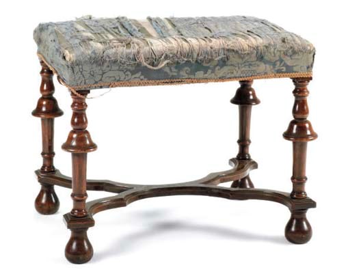 A WALNUT STOOL