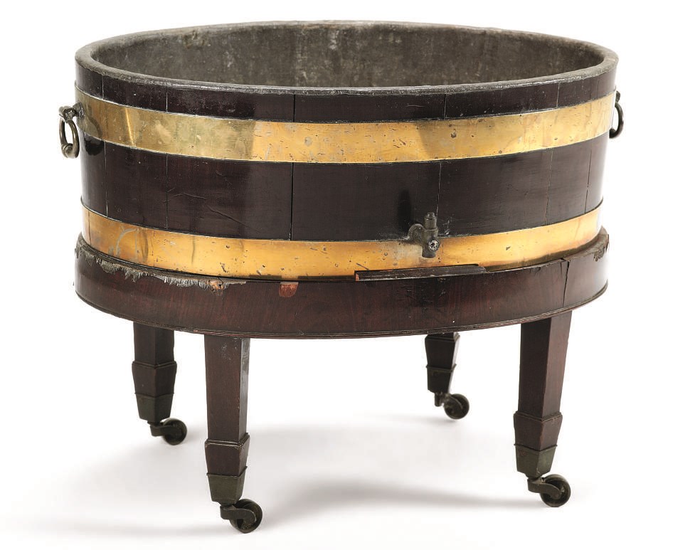 A GEORGE III MAHOGANY AND BRASS-BOUND WINE COOLER ON STAND