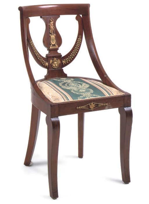 A SET OF THREE MAHOGANY AND GILT-METAL MOUNTED SIDE CHAIRS