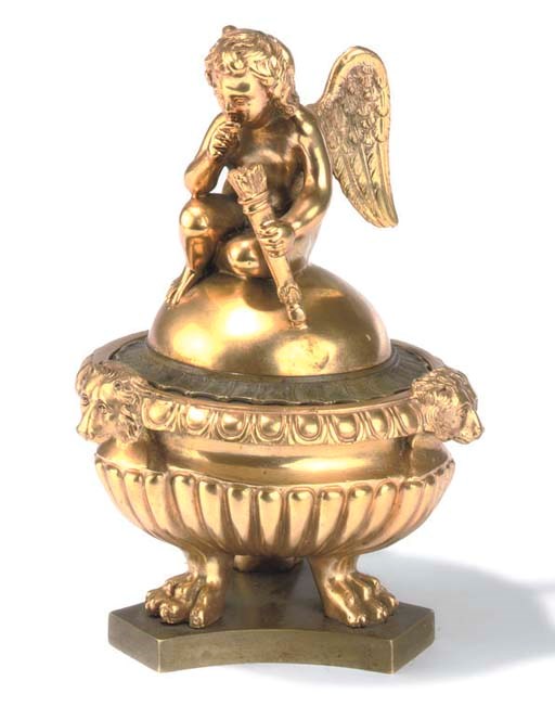 A FRENCH OR ITALIAN BRONZE AND GILT BRONZE INK-STAND
