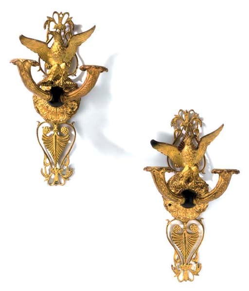 A PAIR OF BRONZE AND GILT BRONZE TWIN BRANCH WALL LIGHTS