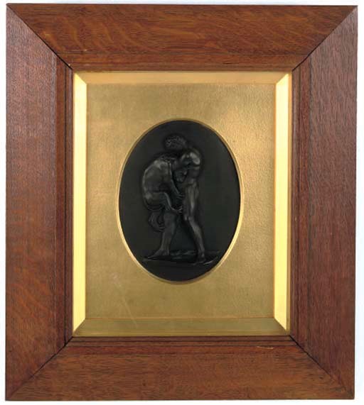 A WEDGWOOD BLACK BASALT RELIEF PLAQUE