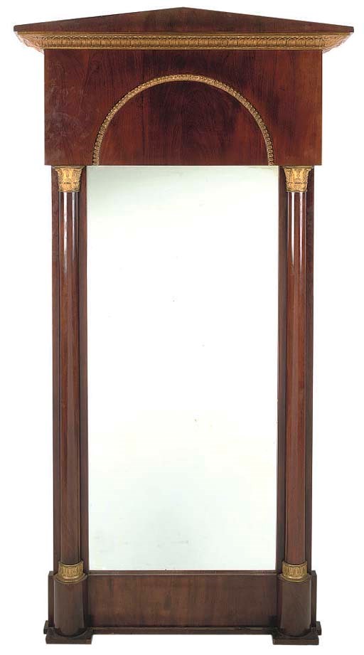 A RESTAURATION MAHOGANY, PARCEL-GILT AND ORMOLU MOUNTED PIER MIRROR