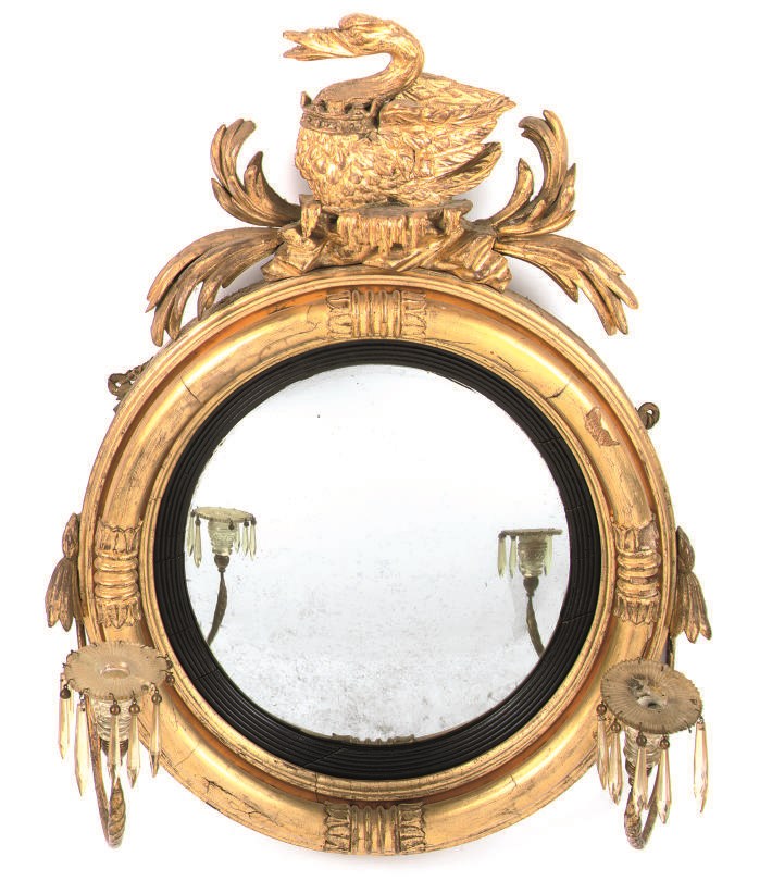 A WILLIAM IV GILTWOOD AND COMPOSITION TWO-BRANCH CONVEX GIRANDOLE MIRROR