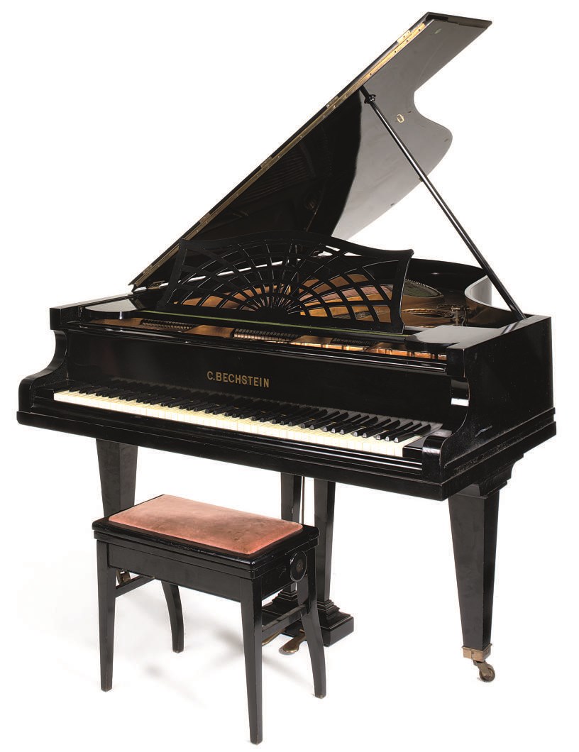 A BECHSTEIN BLACK LACQUER BABY GRAND PIANO