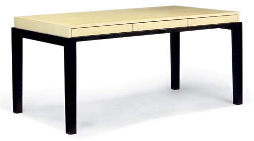 A YELLOW AND BLACK STAINED OAK WRITING TABLE