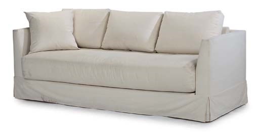 A CREAM-COLOURED COTTON-UPHOLSTERED SOFA