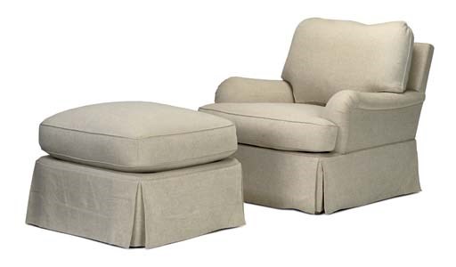 A CAMEL-COLOURED STITCHED COTTON-UPHOLSTERED EASY ARMCHAIR AND MATCHING FOOTSTOOL