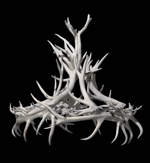 A WHITE-PAINTED ANTLER CHANDELIER