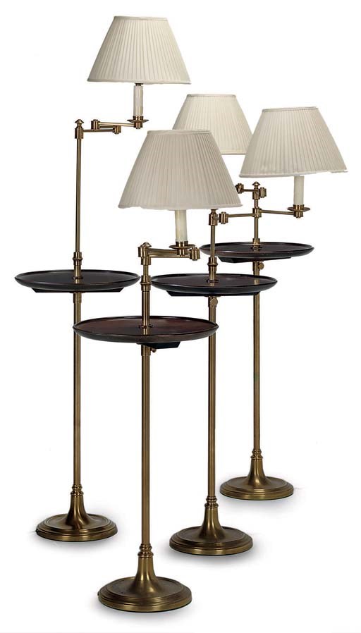A SET OF FOUR BRASS AND MAHOGANY ADJUSTABLE STANDARD LAMPS