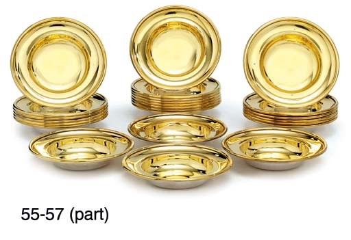A SET OF TWENTY-FOUR ELIZABETH II SILVER-GILT ASHTRAYS