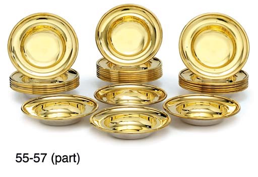 A SET OF TWENTY-FOUR ELIZABETH II SILVER-GILT ASHTRAYS