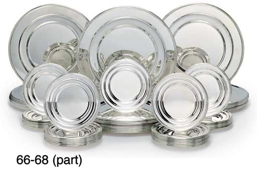 A SET OF THIRTY-ONE ELIZABETH II SILVER SIDE-PLATES