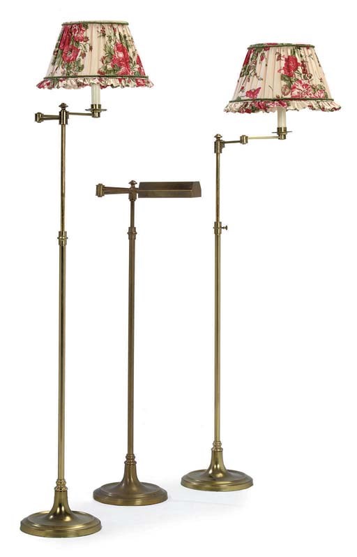 A PAIR OF BRASS ARTICULATED STANDARD LAMPS