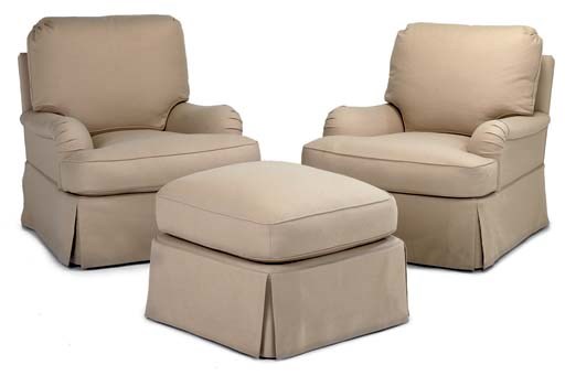 A PAIR OF CAMEL-COLOURED WOOL-UPHOLSTERED EASY ARMCHAIRS AND A MATCHING FOOTSTOOL
